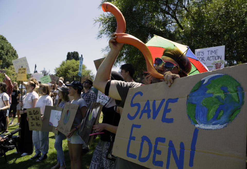 Students demonstrate outside the Union Building in Pretoria, South Africa, Friday, March 15, 2019. Students worldwide are skipping class Friday to take to the streets to protest their governments' failure to take sufficient action against global warming. (AP Photo/Themba Hadebe)