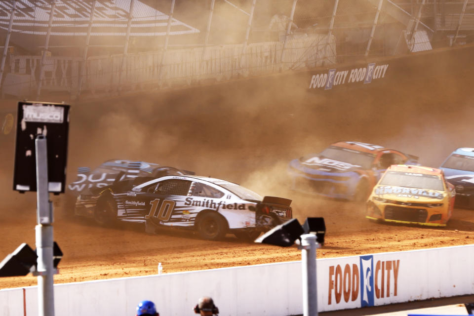 Driver Aric Almirola (10) collides with Anthony Alfredo (38) during a NASCAR Cup Series auto race, Monday, March 29, 2021, in Bristol, Tenn. (AP Photo/Wade Payne)