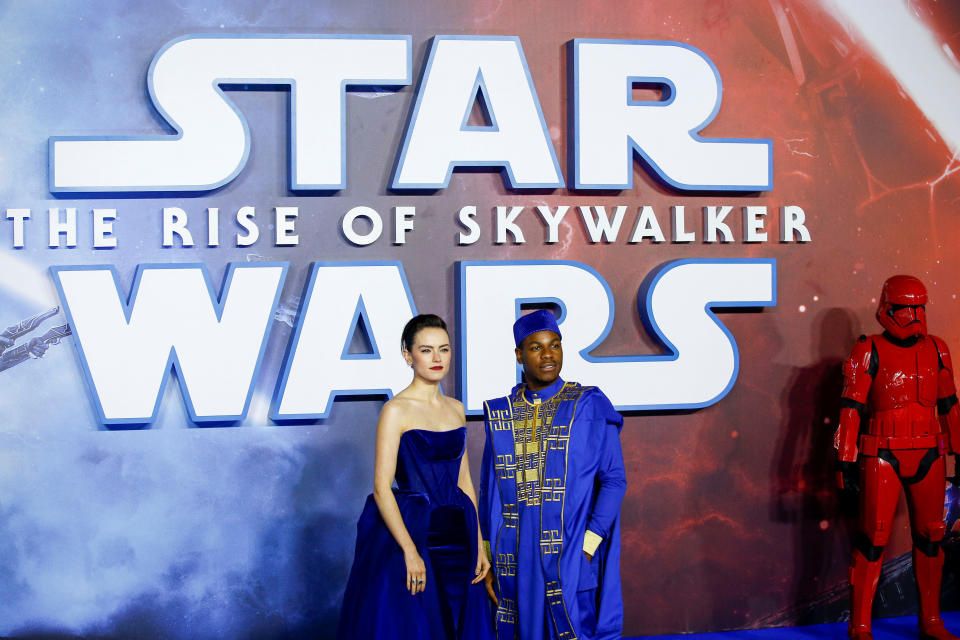 Cast members Daisy Ridley and John Boyega pose as they attend the premiere of "Star Wars: The Rise of Skywalker" in London, Britain, December 18, 2019. REUTERS/Henry Nicholls