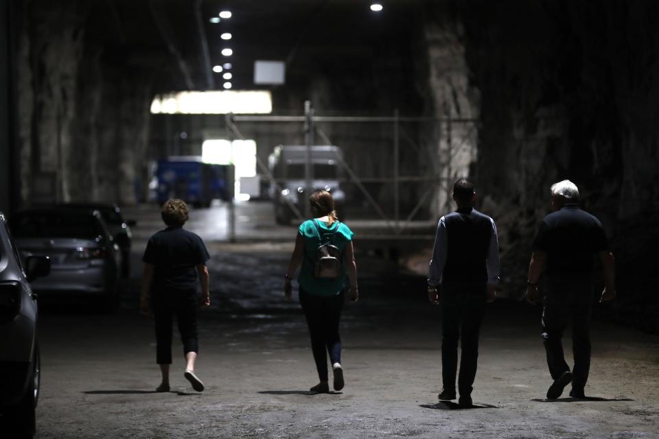 Linda Griffin, the co-owner of Highbridge Springs Water, leads a small group on a tour of her company's cave in Jessamine County. The bottled water company, which is home to Old Limestone Mixing Water, operates out of an old limestone quarry. 
Aug. 3, 2023