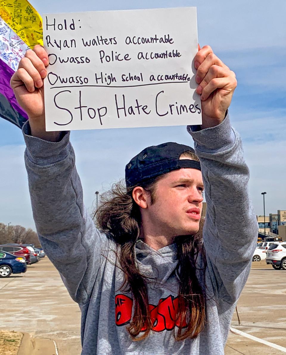 Aiden Cooper, 20, calls for the removal of state schools Superintendent Ryan Walters at a rally Monday in honor of Owasso teen Nex Benedict, whose death earlier this month has drawn widespread outrage.