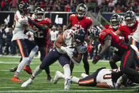 Chicago Bears running back David Montgomery (32) runs into the end zone for a touchdown against the Atlanta Falcons during the second half of an NFL football game, Sunday, Nov. 20, 2022, in Atlanta. (AP Photo/John Bazemore)