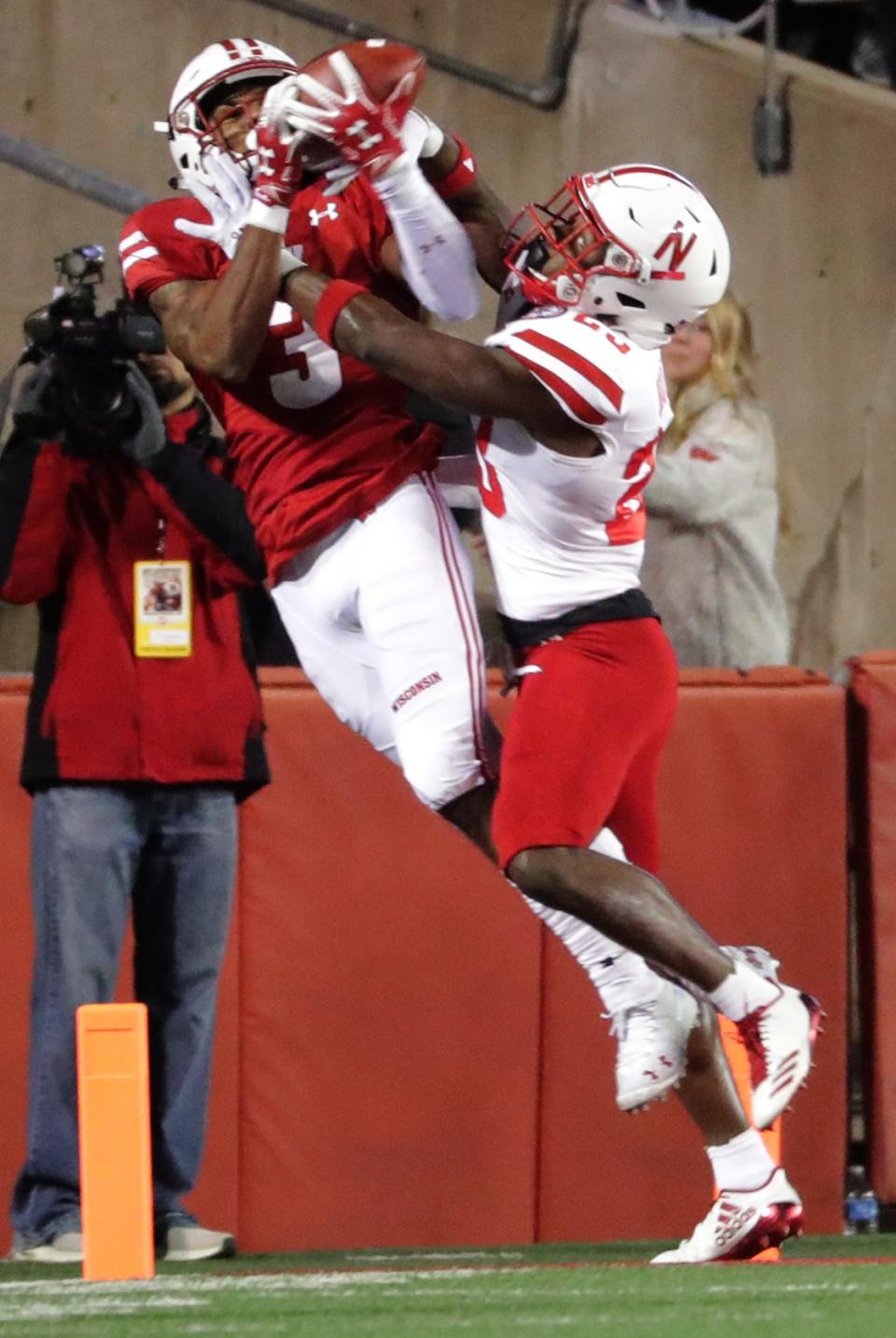 Wisconsin wide receiver Kendric Pryor is unable to stay in bounds while making a catch against Nebraska cornerback Dicaprio Bootle during the first quarter Saturday night.