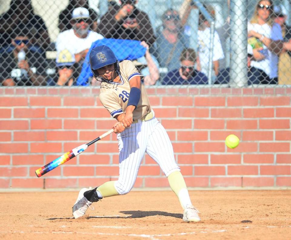 Central Catholic’s Taryn Calderon (28) hits a home run during a game between Oakdale and Central Catholic at Oakdale High School in Oakdale, Calif. on April 17, 2024. Central Catholic won 6-2.