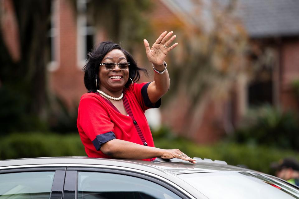 Tallahassee City Commissioner Dianne Williams-Cox greets parade-goers during the Veterans Day parade on South Monroe Street Friday, Nov. 11, 2022 in Tallahassee, Fla. 