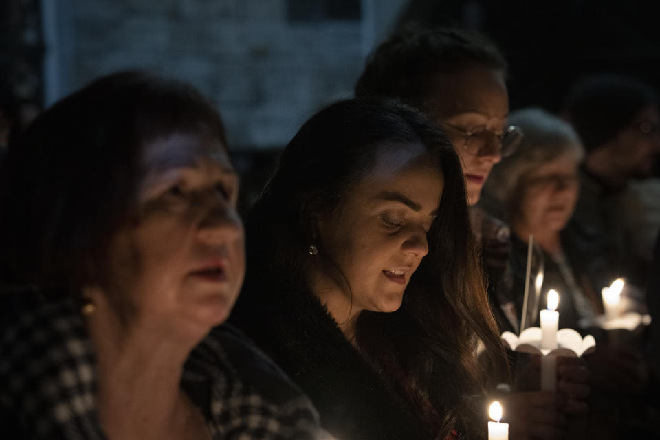 Faithful pray as they take part in a pro-life march in Zagreb, Croatia, Friday, March 15, 2024. Scores of religious and neo-conservative groups in recent years have been building up pressure in the staunchly Catholic country, trying to force a ban on abortions. (AP Photo/Darko Bandic)