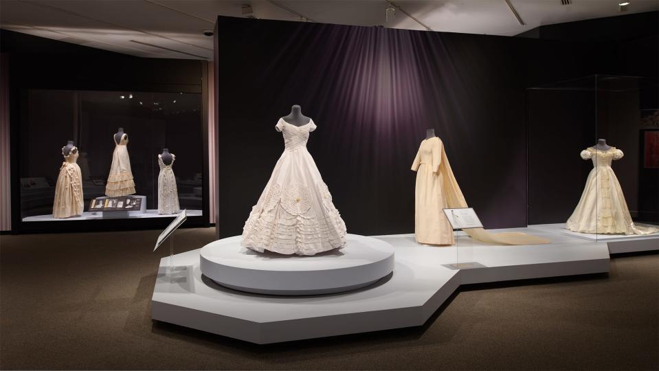 Wedding dress for Jacqueline Bouvier is center; at right is wedding dress made for Ann Bellah Copeland for her wedding on June 6, 1964. Copeland is a former longtime Palm Beacher who now lives in West Palm Beach. Her full-length gown is, among other things, made from ivory silk faille with clean, simple lines, no fussy ornamentation, and a court train that sweeps down from the shoulders, according to the Winterthur.