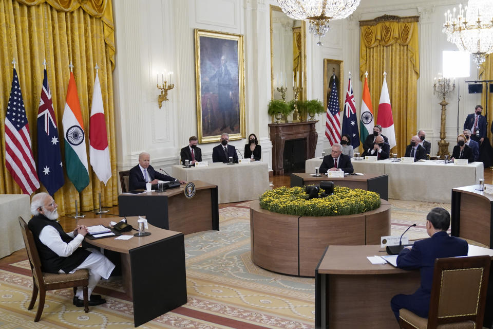 President Joe Biden listens during the Quad summit with Australian Prime Minister Scott Morrison, Indian Prime Minister Narendra Modi, and Japanese Prime Minister Yoshihide Suga, in the East Room of the White House, Friday, Sept. 24, 2021, in Washington. (AP Photo/Evan Vucci)