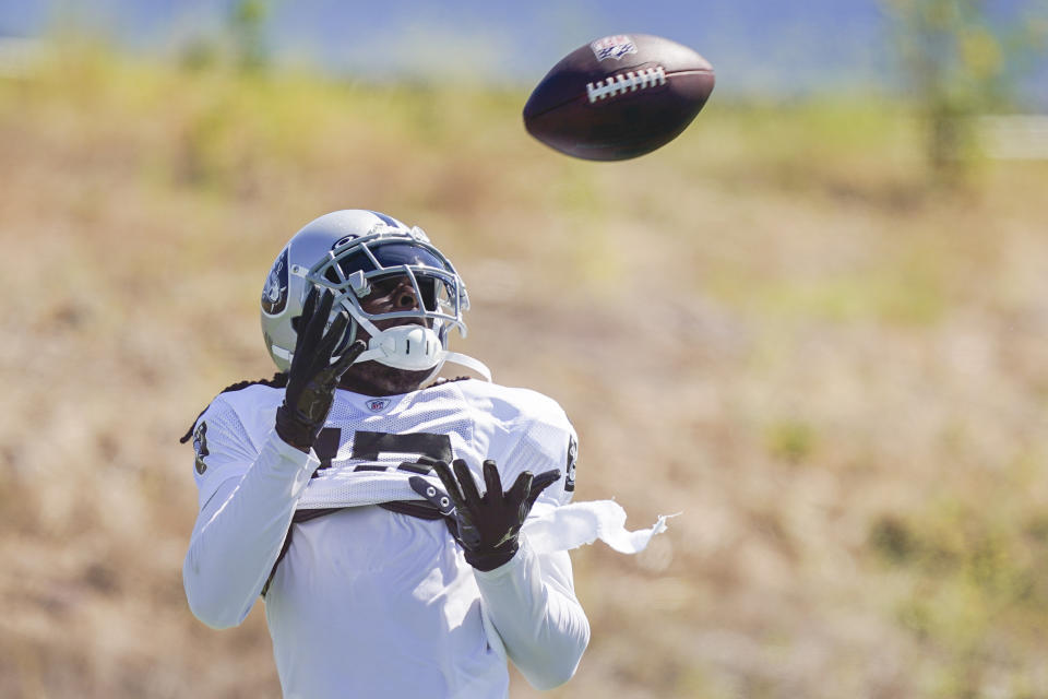 Las Vegas Raiders wide receiver Davante Adams participates in a drill against Los Angeles Rams cornerback Robert Rochell (8) during a joint NFL football practice, Wednesday, Aug. 16, 2023, in Thousand Oaks, Calif. (AP Photo/Ryan Sun)