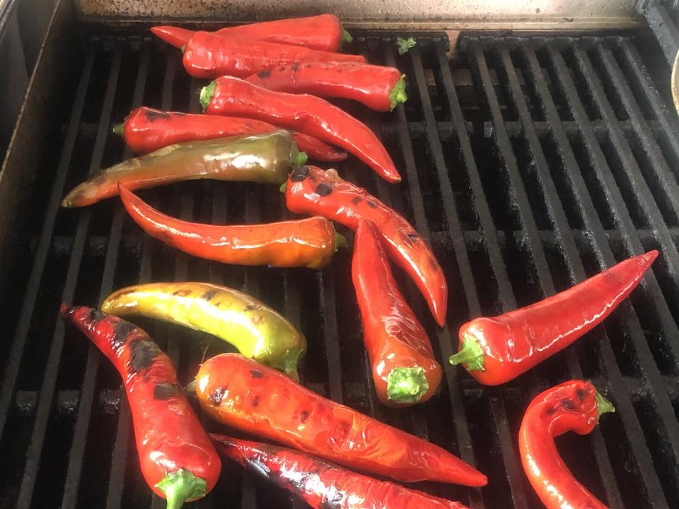 Grilling Pueblo chiles at the Steel City Cafe food truck, April 2021.