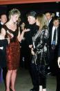 <p>At the same gathering, his wife Linda and Princess Diana matched in velvet dresses.</p>