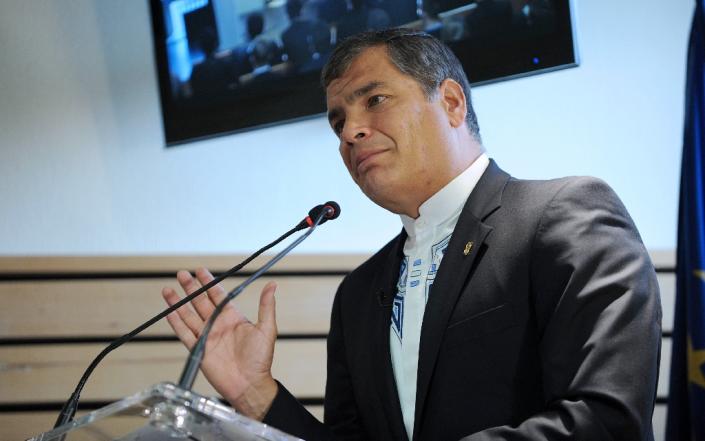 Ecuador's President Rafael Correa said he will call for "environmental justice" at the world climate summit in Paris (AFP Photo/Guillaume Souvant)