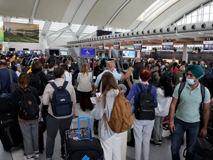 Travelers wait to check-in at Toronto Pearson International Airport on June 30, 2022 in Mississauga, Ontario.