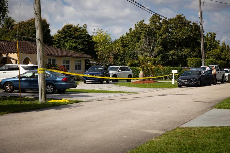 Miami-Dade police officers cordoned off a home where investigators say a man shot and killed himself near Miami, Florida, Wednesday, March 13, 2024. Alie Skowronski/askowronski@miamiherald.com