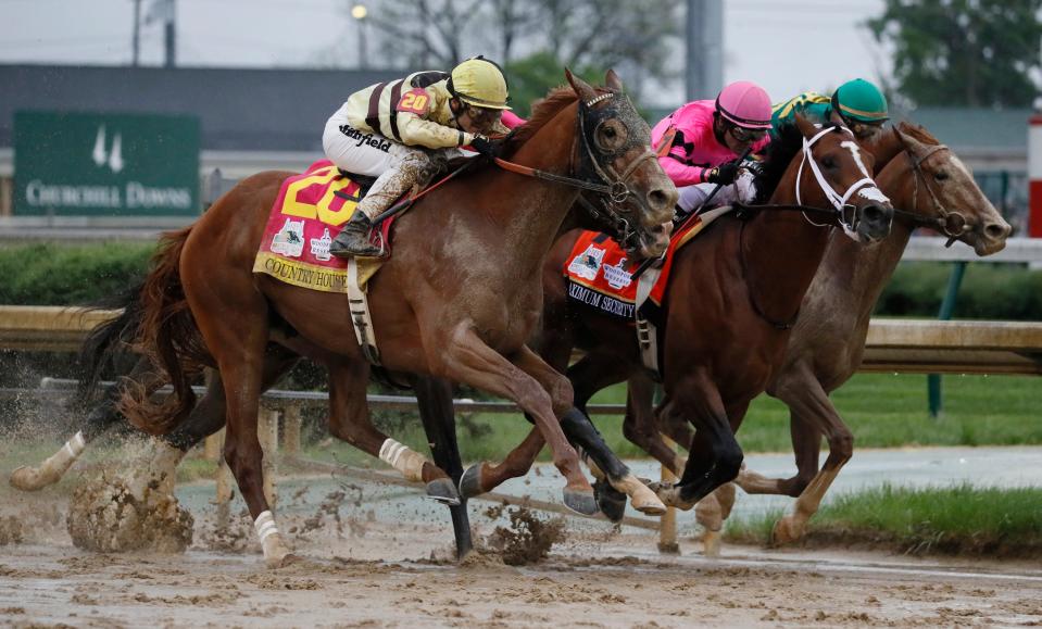 The 145th running of the Kentucky Derby at Churchill Downs in 2019. Country House, left, ended up edging Maximum Security, center, for victory after a review.