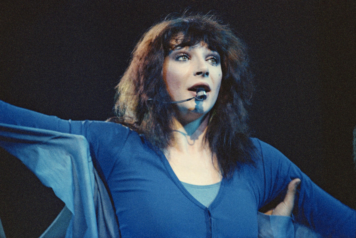 LONDON - 12th MAY: English singer Kate Bush performs live on stage at Hammersmith Odeon in London on the penultimate date of her European tour on 12th May 1979. (Photo by Pete Still/Redferns)