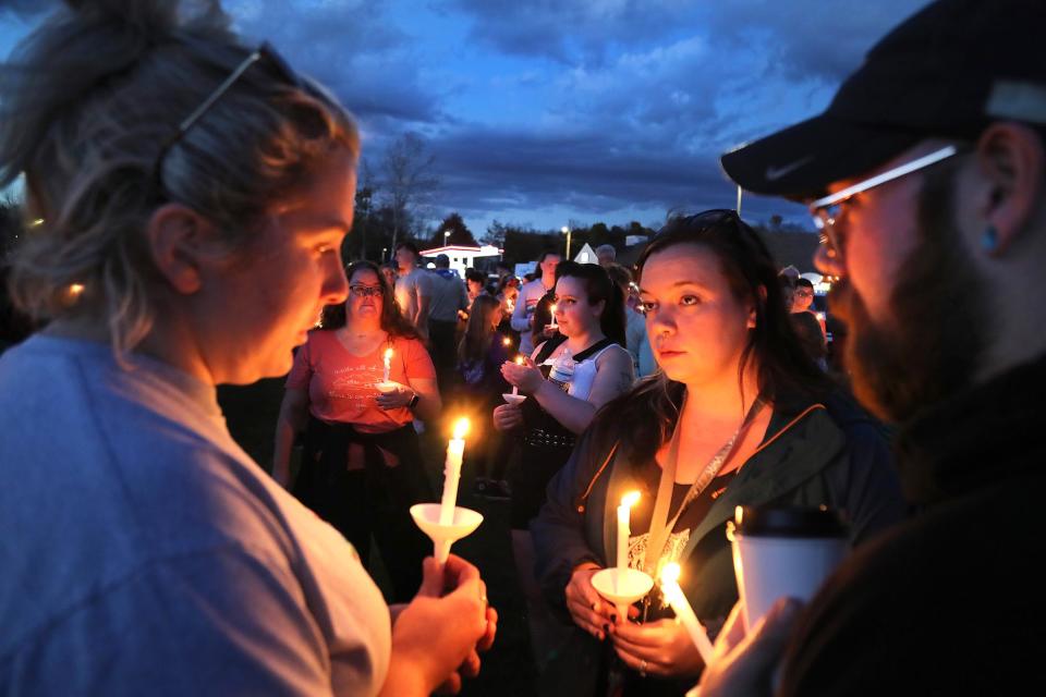 Lisbon, ME - October 28: Hundreds gathered on the Lisbon Falls waterfront for a candlelight vigil to honor those who died and were injured in the mass shooting in Lewiston. (Photo by John Tlumacki/The Boston Globe via Getty Images)