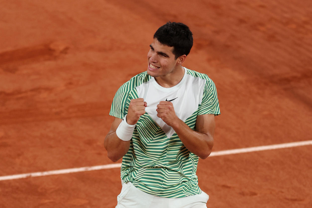 PARIS, FRANCE - JUNE 06: Carlos Alcaraz of Spain celebrates winning match point against Stefanos Tsitsipas of Greece during the Men's Singles Quarter Final match on Day Ten of the 2023 French Open at Roland Garros on June 06, 2023 in Paris, France. (Photo by Julian Finney/Getty Images)