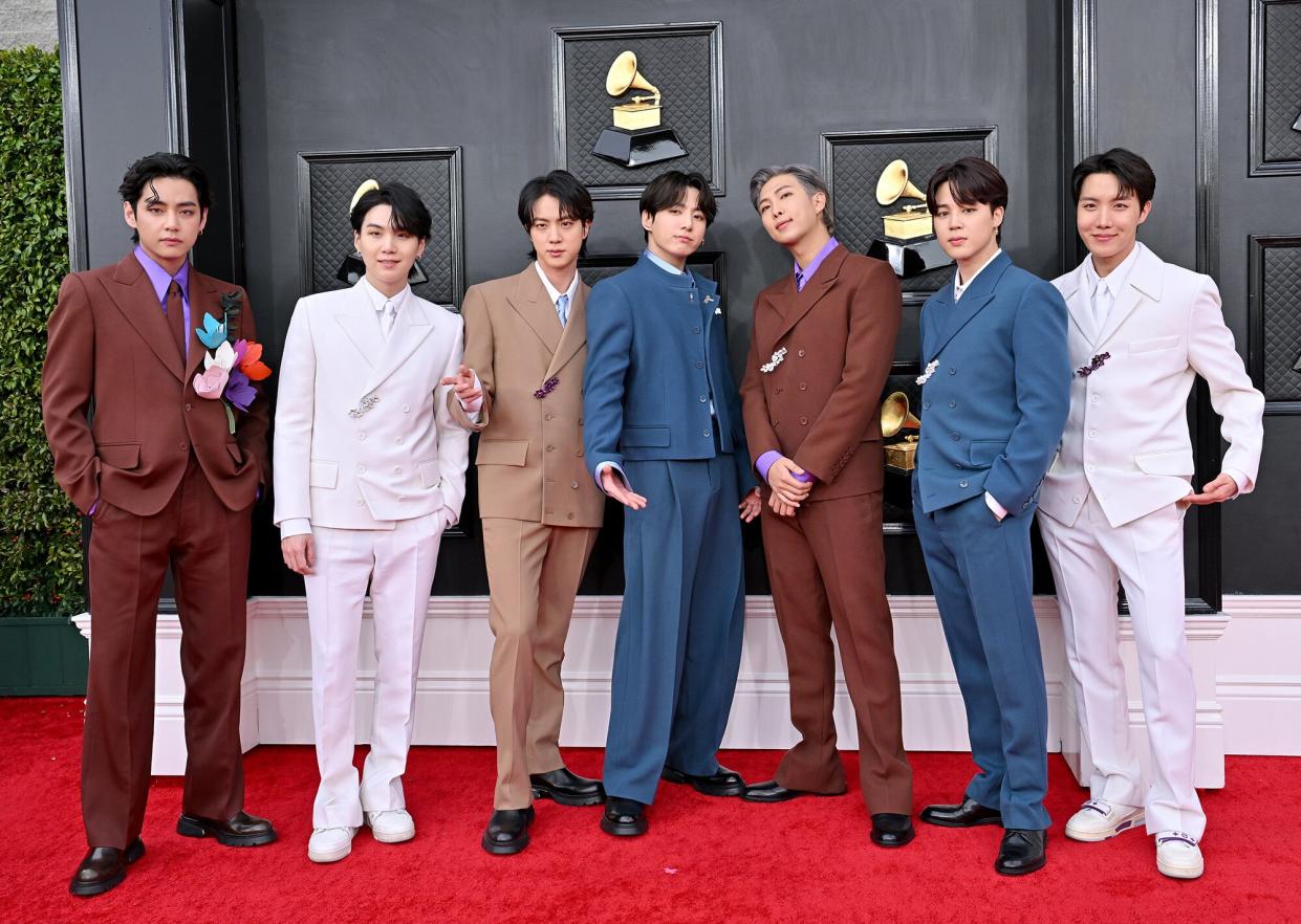 V, Suga, Jin, Jungkook, RM, Jimin and J-Hope of BTS attends the 64th Annual GRAMMY Awards at MGM Grand Garden Arena on April 03, 2022 in Las Vegas, Nevada