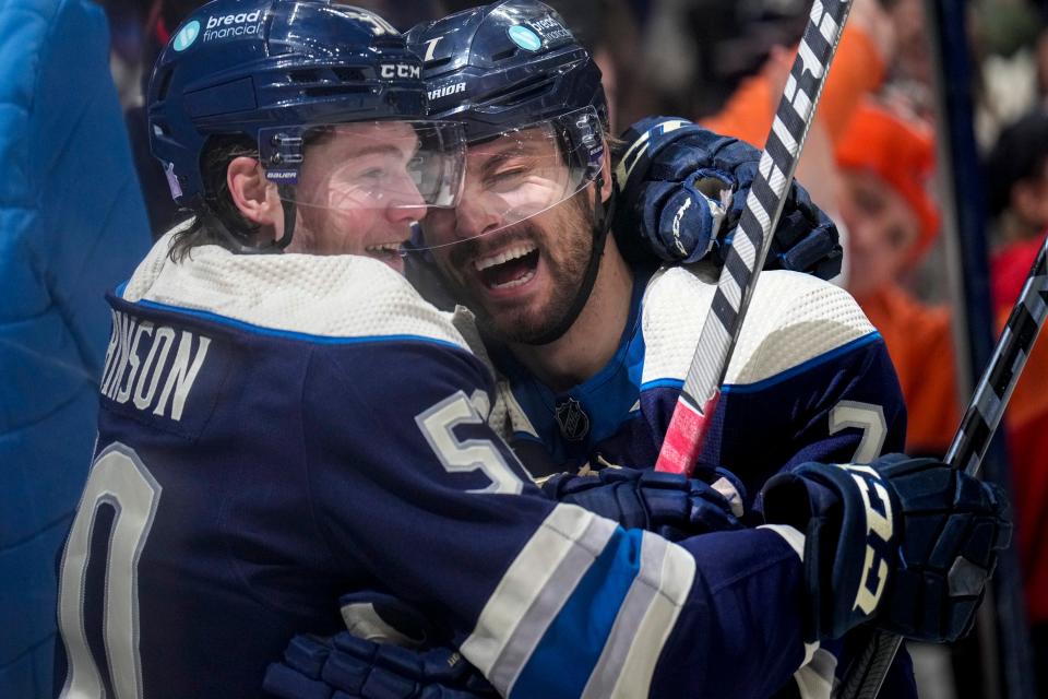 Nov 20, 2022; Columbus, Ohio, United States;  Columbus Blue Jackets forward Sean Kuraly (7) celebrates with forward Eric Robinson (50) after scoring the team’s 3rd goal during the third period of the NHL hockey game at Nationwide Arena. Mandatory Credit: Joseph Scheller-The Columbus Dispatch