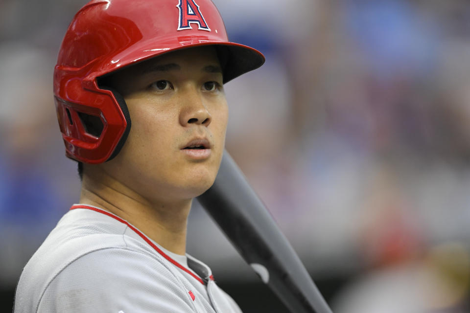 Los Angeles Angels' Shohei Ohtani prepares to bat against the Kansas City Royals during the first inning of a baseball game, Monday, July 25, 2022, in Kansas City, Mo. (AP Photo/Reed Hoffmann)