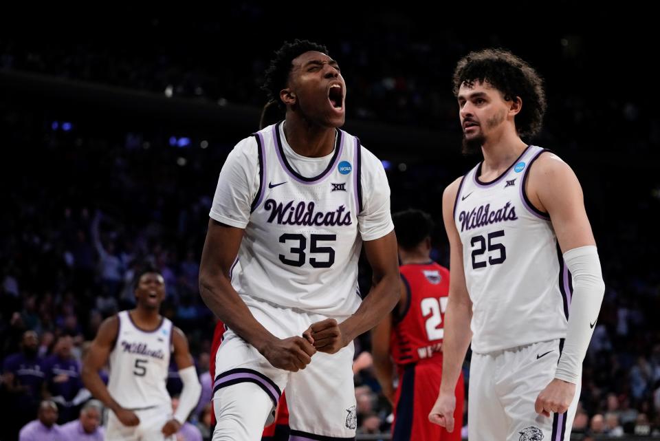 Kansas State forward Nae'Qwan Tomlin (35) reacts after making a play during the Wildcats' NCAA Tournament Elite Eight game against Florida Atlantic.