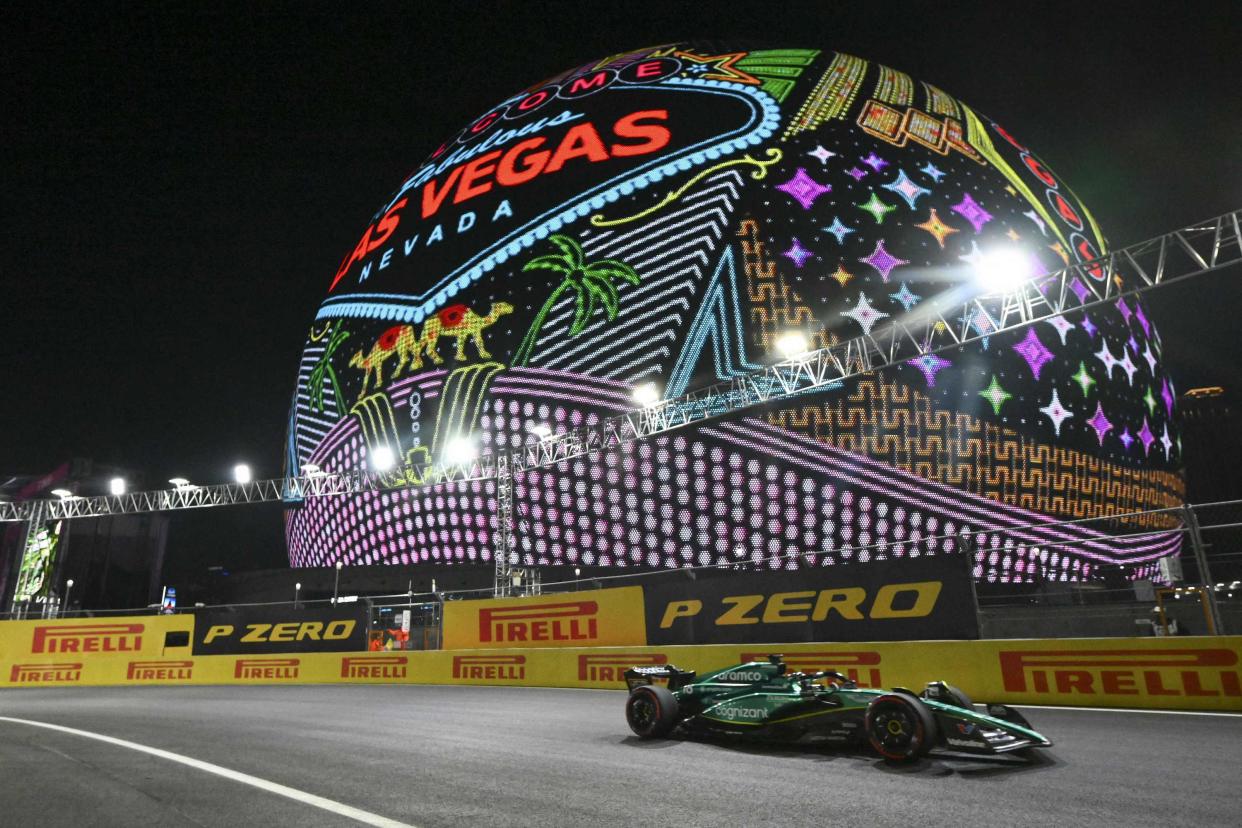 Lance Stroll drives past the Sphere during a practice session ahead of last month's Las Vegas Grand Prix. (Angela Weiss/AFP via Getty Images)