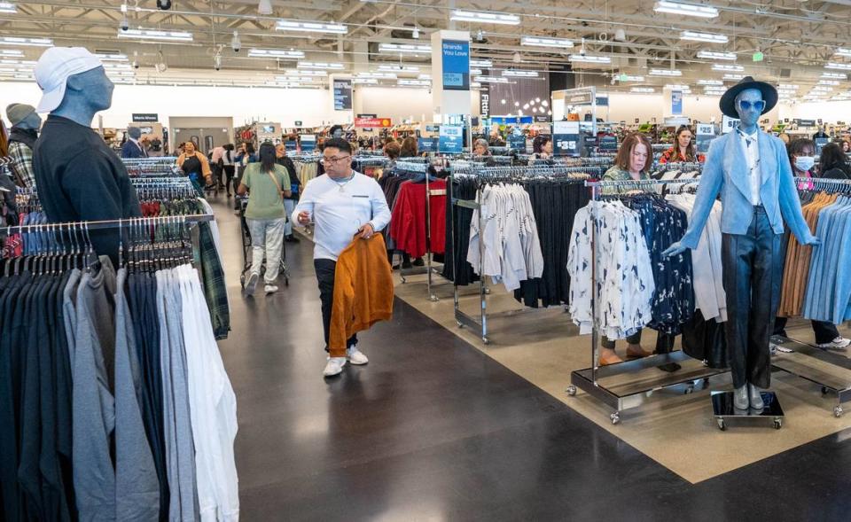 Customers take advantage of an opening day exclusive shopping party on Tuesday, Oct. 24, 2023, at Nordstrom Rack in Natomas.