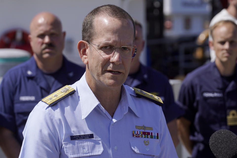 U.S. Coast Guard Rear Adm. John Mauger, commander of the First Coast Guard District, talks to the media, Thursday, June 22, 2023, at Coast Guard Base Boston, in Boston. The missing submersible Titan imploded near the wreckage of the Titanic, killing all five people on board, according to the U.S. Coast Guard. (AP Photo/Steven Senne)