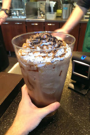 A Starbucks frappuccino, containing 60 shots of espresso and topped with whipped cream, which took Andrew Chifari of Texas five days to consume is seen in Dallas, Texas in this May 24, 2014 picture provided by Chifari. REUTERS/Andrew Chifari/Handout via Reuters
