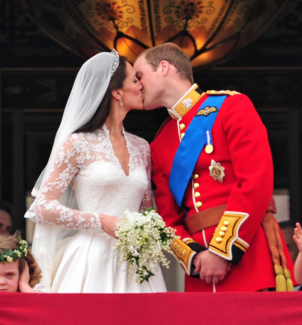 Prince William and Kate Middleton famously kissed on the Buckingham Palace balcony on their wedding day. Photo: Getty Images