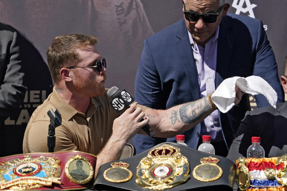 Unified WBC/WBO/WBA super middleweight champion Canelo Alvarez speaks during a news conference Tuesday, Sept. 21, 2021, in Beverly Hills, Calif. to announce his 168-pound title bout against undefeated IBF Super Middleweight Champion Caleb Plant. The fight is scheduled for Saturday, Nov. 6 in Las Vegas. (AP Photo/Mark J. Terrill)