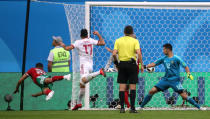 Soccer Football - World Cup - Group B - Morocco vs Iran - Saint Petersburg Stadium, Saint Petersburg, Russia - June 15, 2018 Morocco's Aziz Bouhaddouz scores an own goal and the first goal for Iran REUTERS/Pilar Olivares