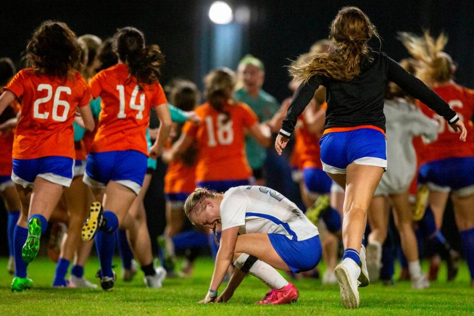 Ocean Springs’ Jaylen Bodry reacts as Gulfport celebrates winning the 6A South State Championship game in Gulfport on Tuesday, Jan. 31, 2023.