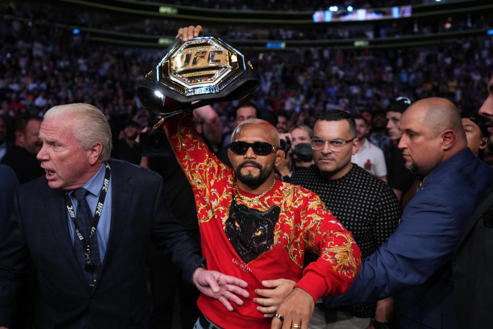 DALLAS, TEXAS - JULY 30: Deiveson Figueiredo of Brazil holds his championship belt after Moreno defeated Kai Kara-France of New Zealand in the interim UFC flyweight championship fight during the UFC 277 event at American Airlines Center on July 30, 2022 in Dallas, Texas. (Photo by Chris Unger/Zuffa LLC)