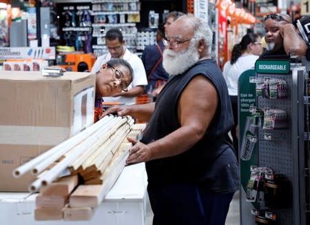 Local residents get supplies ahead of the arrival of Hurricane Dorian in Kissimmee