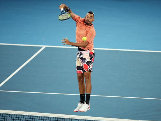 Nick Kyrgios plays an overhead shot against Karen Khachanov (Getty Images)