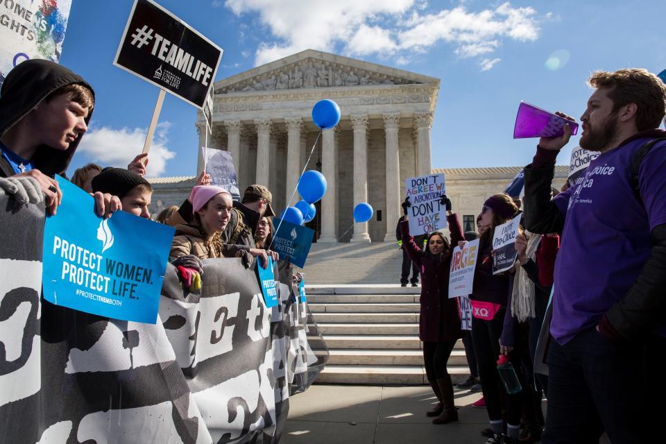 Demonstrators on both sides of the issue rally outside the Supreme Court in 2016, when the justices heard a major case from Texas on abortion restrictions. An almost identical case from Louisiana is pending.