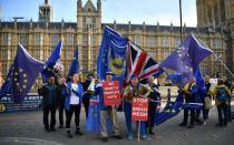 Anti-Brexit demonstrators protest outside parliament as the cabinet meets to decide on a draft deal on Britain's divorce from the European Union