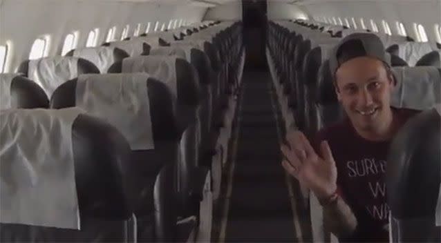 Kyle McNicol on board the empty flight. Source: Carrie Fisher/Twitter