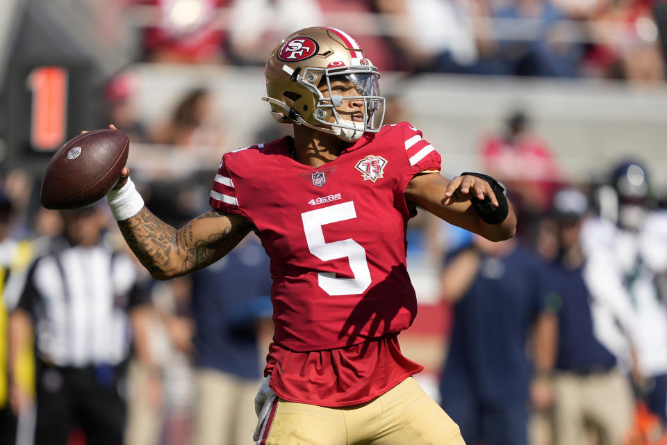 San Francisco 49ers quarterback Trey Lance (5) passes against the Seattle Seahawks during the second half of an NFL football game in Santa Clara, Calif., Sunday, Oct. 3, 2021. (AP Photo/Tony Avelar)