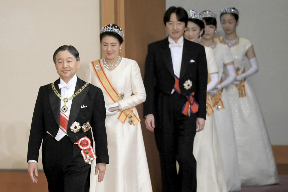 Japan's Emperor Naruhito, Empress Masako, Crown Prince Fumihito of Akishino, Princess Kiko, Princess Mako and Princess Kako attend the New Year's Day celebration at the Imperial Palace in Tokyo on Jan. 1, 2020. (Kunihiko Miura / AP)