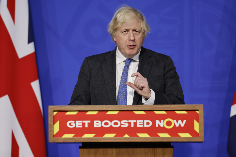 Britain's Prime Minister Boris Johnson speaks during a media briefing on COVID-19, in Downing Street, London, Wednesday Dec. 15, 2021. (Tolga Akmen/Pool via AP)