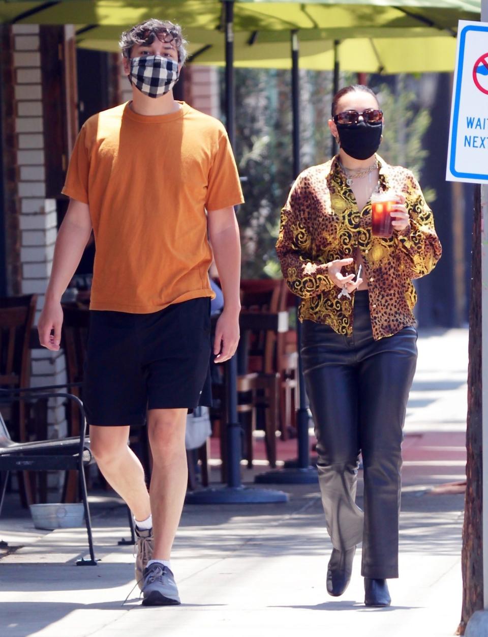 <p>Charli XCX and boyfriend Huck Kwong grab to-go coffees in Los Angeles on Thursday. </p>