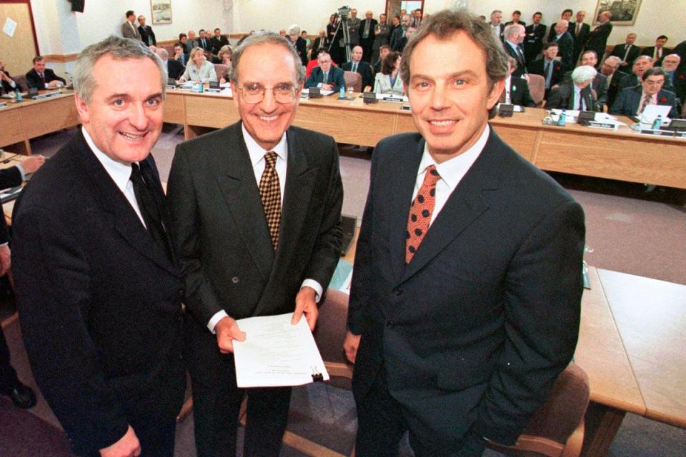 Irish prime minister Bertie Ahern (left), US Senator George Mitchell (centre) and British prime minister Tony Blair pose together after signing the Good Friday Agreement in Belfast in April 1998 (AP1998)