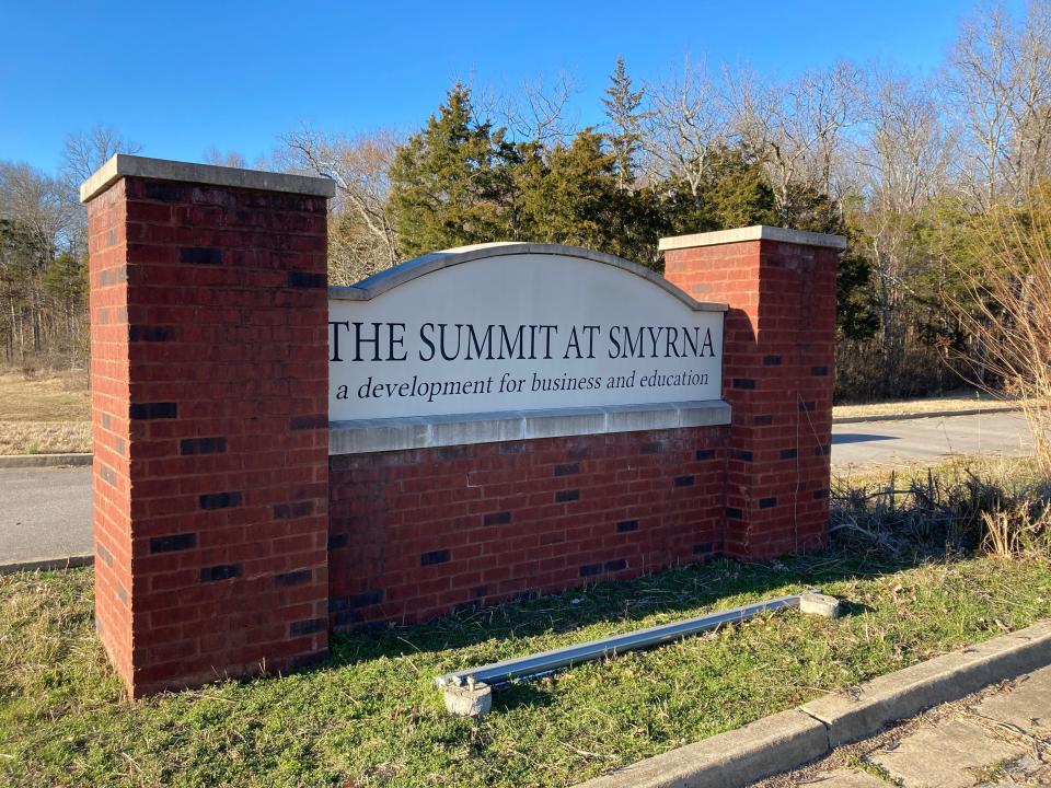 The sign for "The Summit at Smyrna" that touted "a development for business and education" will instead be the planned Sewart's Landing project that includes two large medical offices, a 240-room hotel, 250,000 square feet of street level retail space and 75 townhomes.