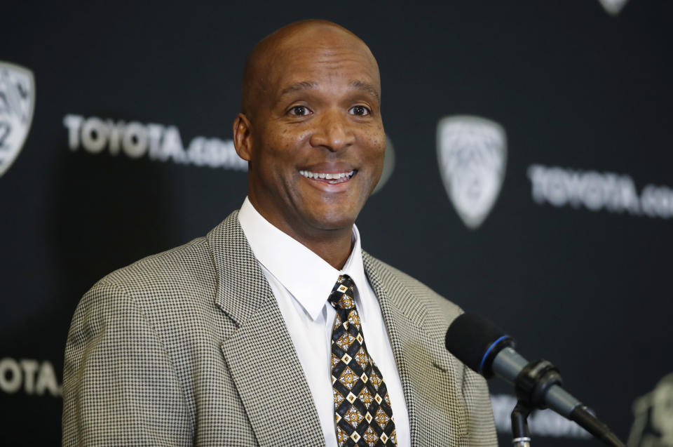 FILE - In this Feb. 24, 2020, file photo, Karl Dorrell smiles as he responds to a question during a news conference to announce that he is the new NCAA college head football coach at Colorado during a news conference in Boulder, Colo. Colorado will host UCLA on Nov. 7, 2020, to begin the Dorrell Era in Boulder, where he steps in for Mel Tucker after Tucker unexpectedly bolted for Michigan State in February. (AP Photo/David Zalubowski, File)