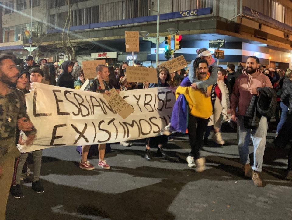 People holding banner at the Marcha por la Diversidad in Montevideo, Uruguay