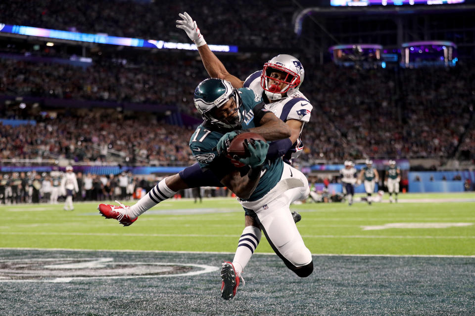 <p>Alshon Jeffery #17 of the Philadelphia Eagles catches a 34 yard pass, over Eric Rowe #25 of the New England Patriots, for a touchdown during the first quarter in Super Bowl LII at U.S. Bank Stadium on February 4, 2018 in Minneapolis, Minnesota. (Photo by Patrick Smith/Getty Images) </p>