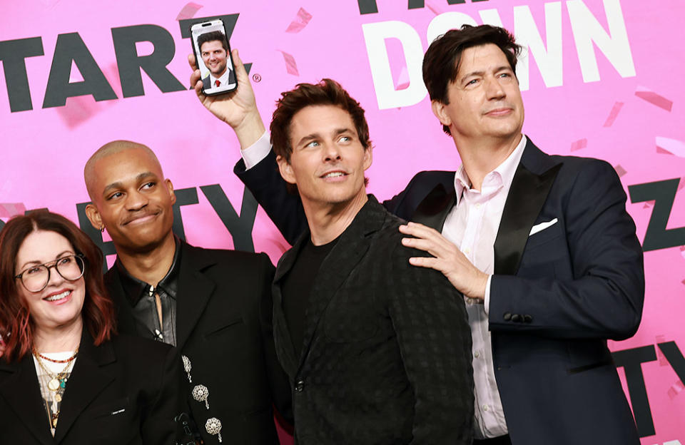 (L-R) Megan Mullally, Tyrel Jackson Williams, James Marsden and Ken Marino, holds up a phone with a picture of Adam Scott, during the Red Carpet Premiere of STARZ's "Party Down" Season 3 at Regency Bruin Theatre on February 22, 2023 in Los Angeles, California.